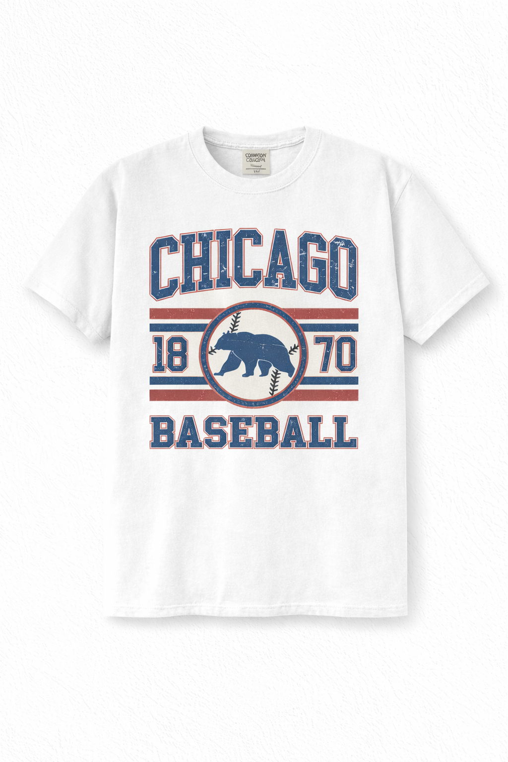 White Comfort Colors T-shirt with vintage Chicago 1870 Baseball graphic in distressed blue lettering and red stripes.