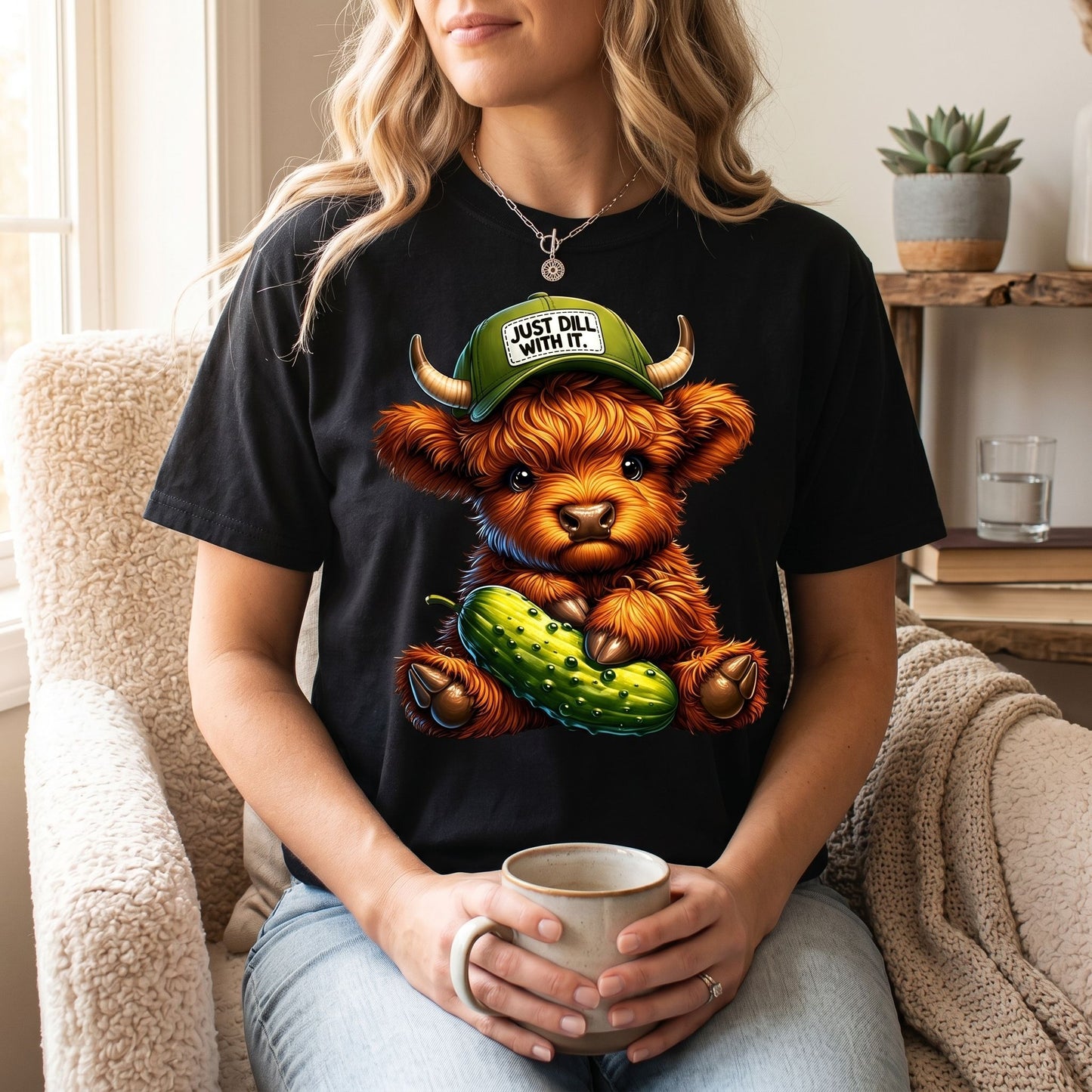 Home ambiance with Highland Cow T-Shirt styled in a warm, cozy environment with natural light.