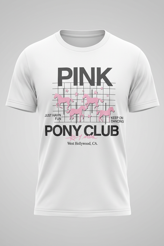 White "Pink Pony Club" graphic tee with pink carousel horses on a grid pattern, front view.