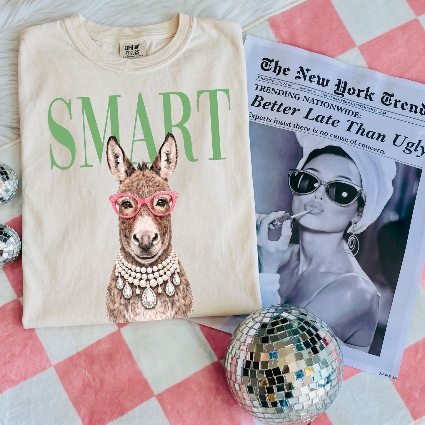 Comfort Colors SMART Donkey Tee worn in a cozy living room setting, showcasing its relaxed fit and vibrant print.