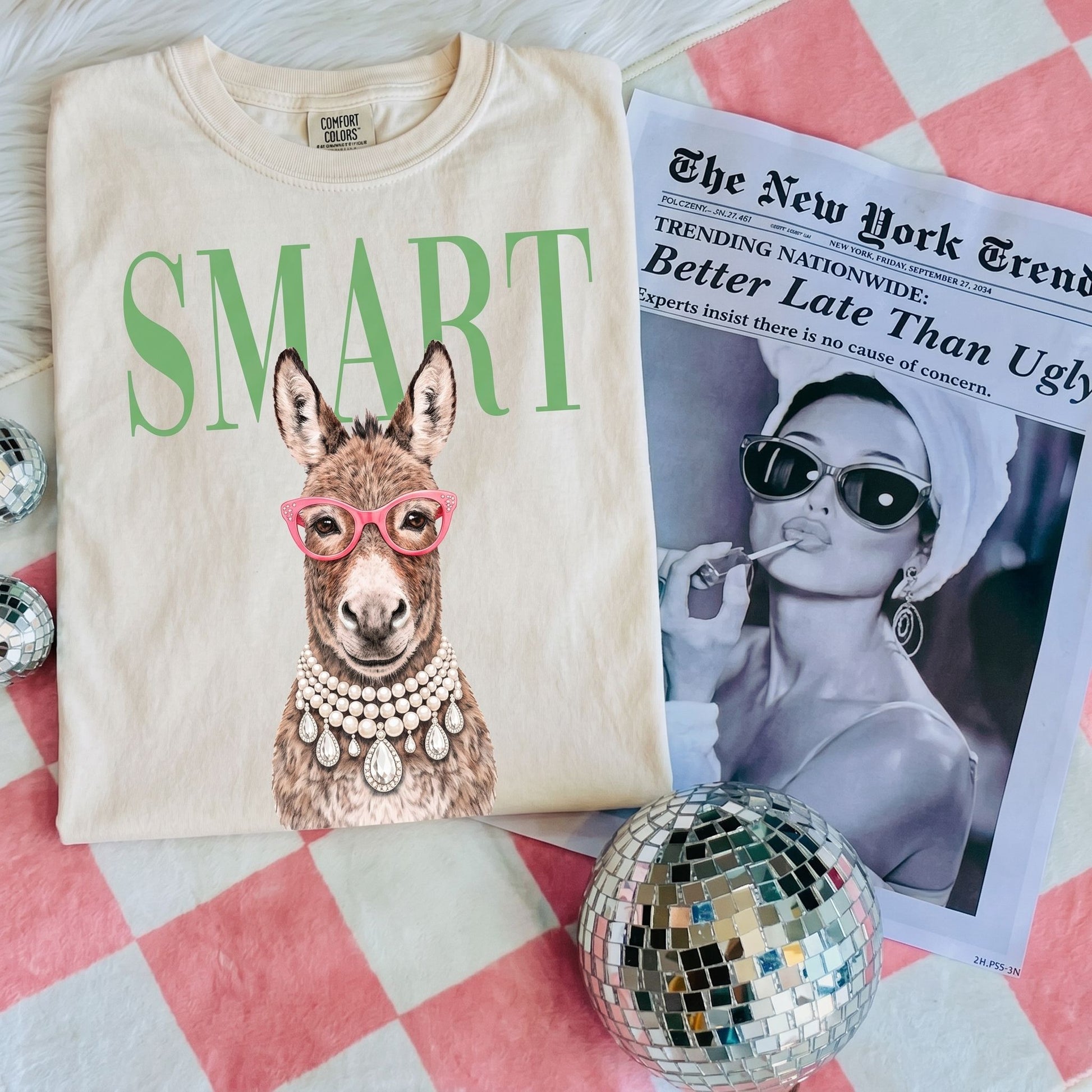 Comfort Colors SMART Donkey Tee worn in a cozy living room setting, showcasing its relaxed fit and vibrant print.