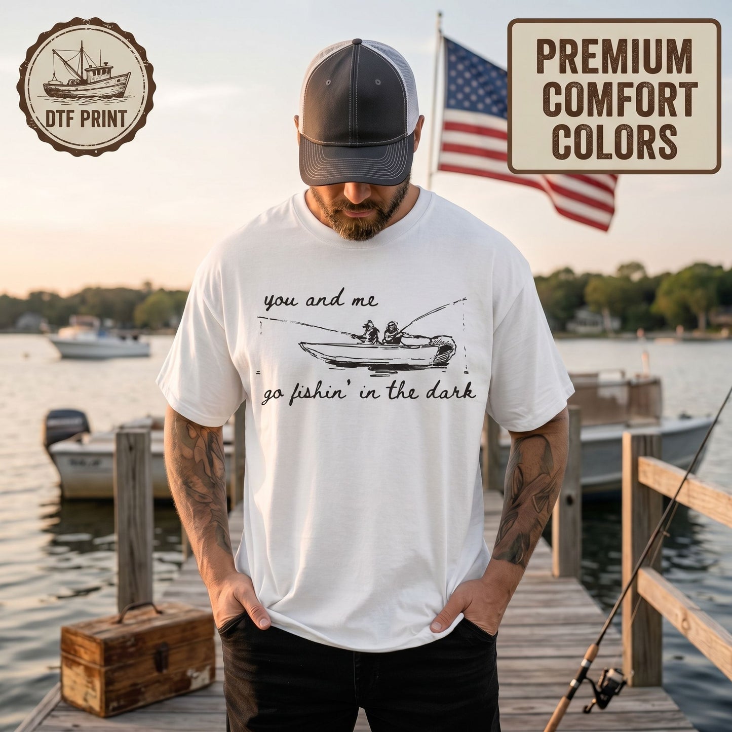 Relaxed person wearing graphic tee in cafe setting, emphasizing comfortable fit and stylish vintage look.
